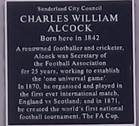 Alcock's blue plaque, outside 10 Norfolk Street