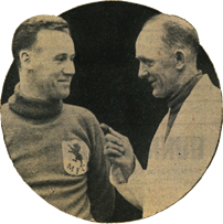 Frank Jefferis (Millwall FC trainer) chatting with new goalkeeper, John Burke, in 1937